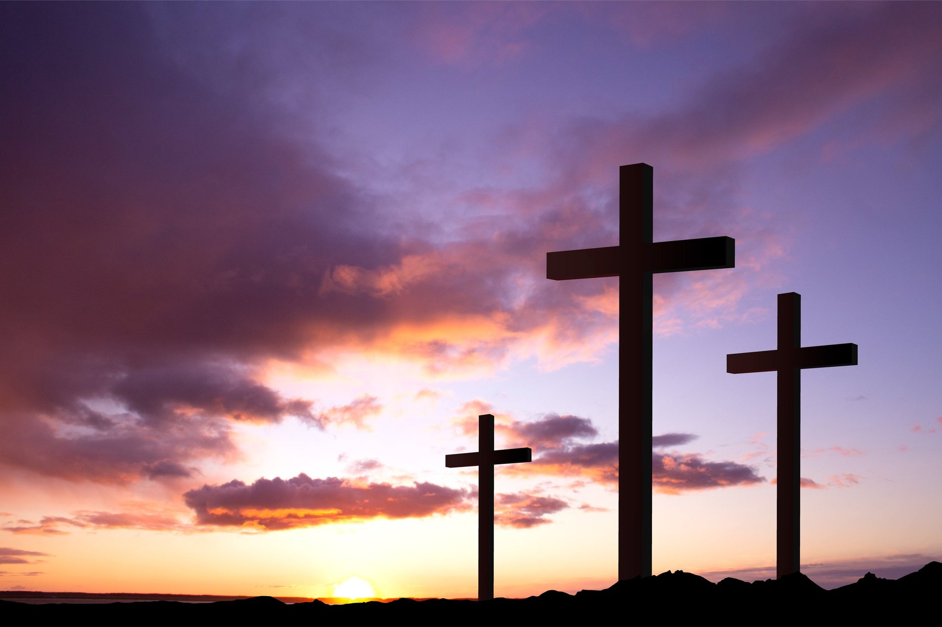 Good Friday - Friday before Easter - Christian crosses against the sunset